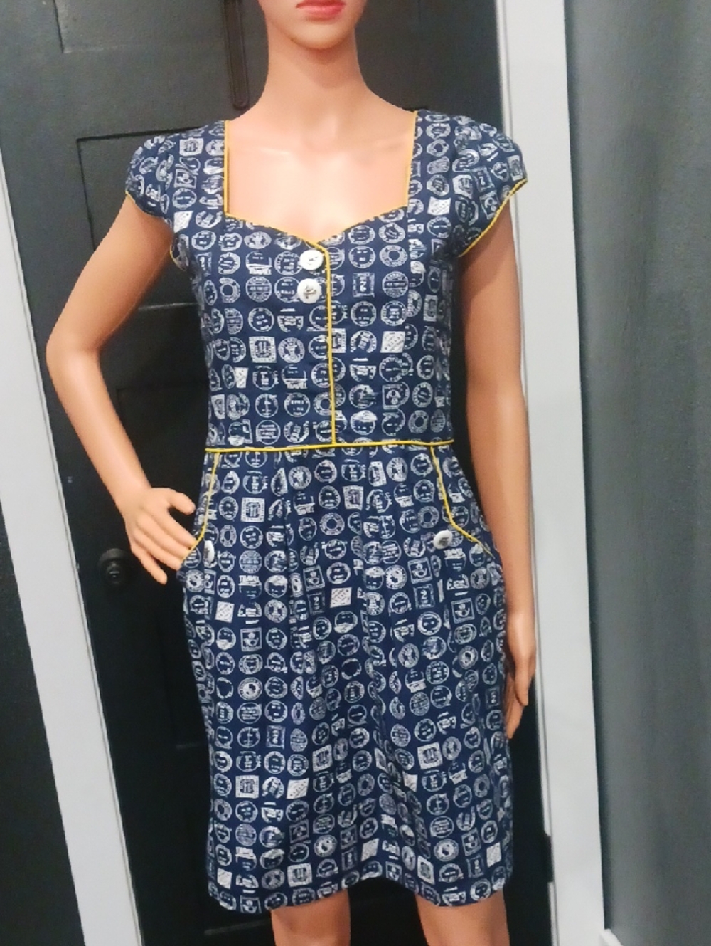 Trollied Dolly Vintage-Style Stamp Print Mini Dress Yellow Piping Datails